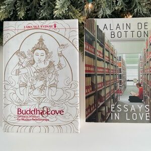 Set of books with a Valentine’s Day vibe: 
Buddha & Love, and Essays in Love